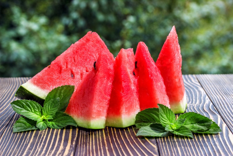 Fresh sliced watermelon wooden  old background